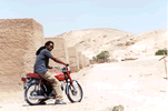 On our bike outside Temple of Seti